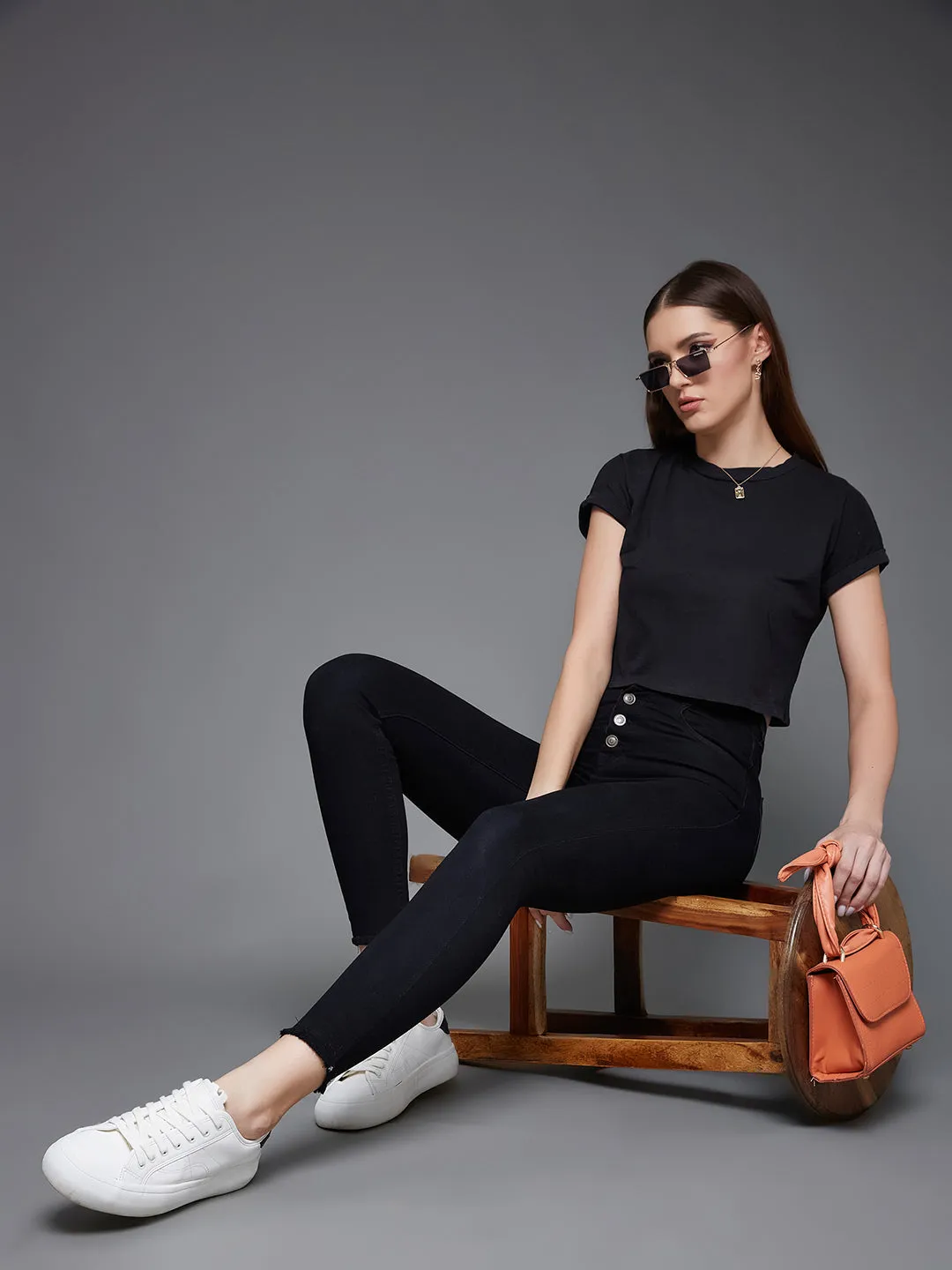 Women's Black Skinny High Rise Cropped Fringed Hemline Stretchable Denim Jeans